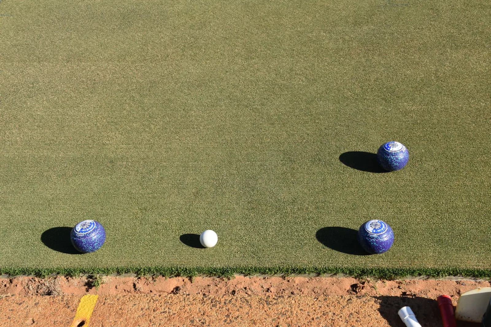Bowls resting close to the jack against the ditch board